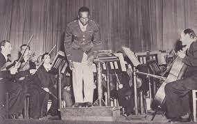 Rudolph Dunbar- the pioneering musician, and campaigning black journalist  and World War II correspondent who covered the liberation of Europe with a  conductor's baton in his knapsack – CIoJ Journal